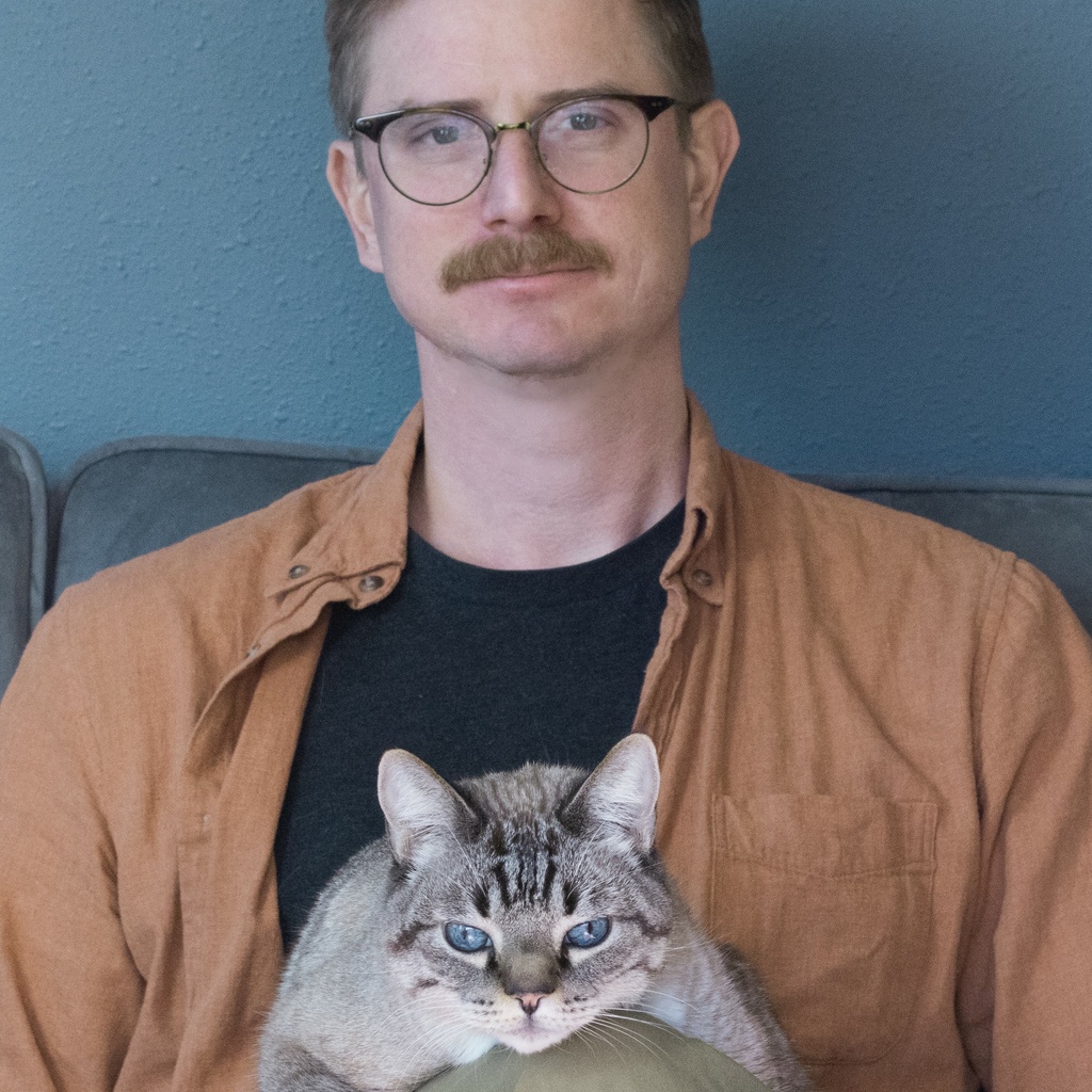 Thomas Mira y Lopez with cat