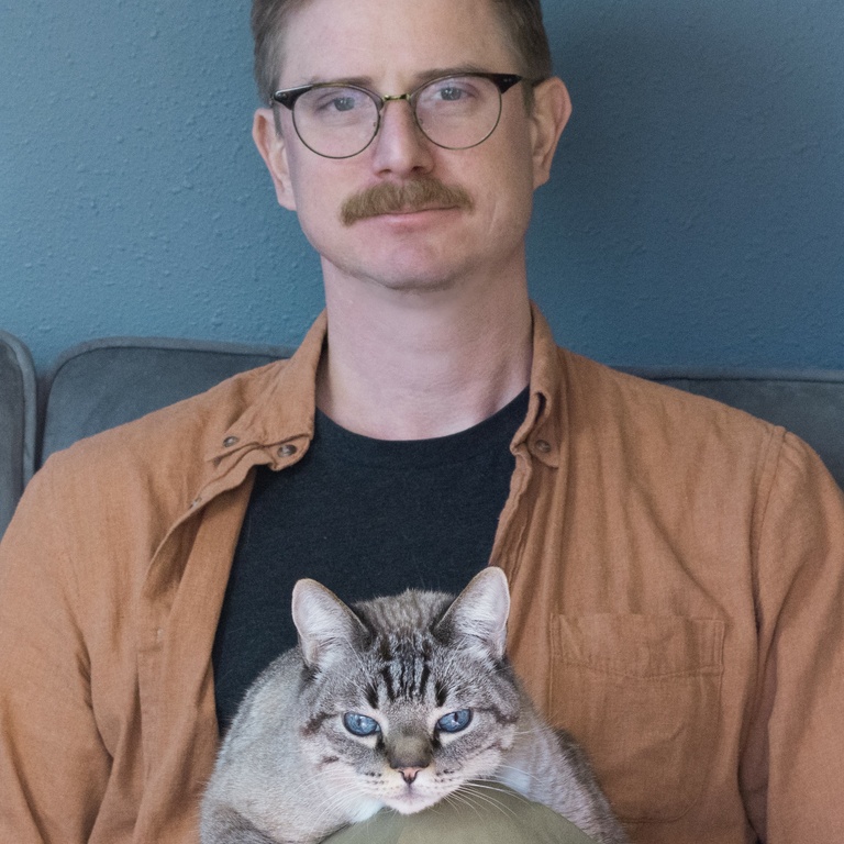 Thomas Mira y Lopez with cat